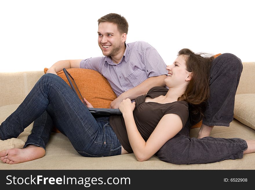 Casual couple together on sofa. Casual couple together on sofa