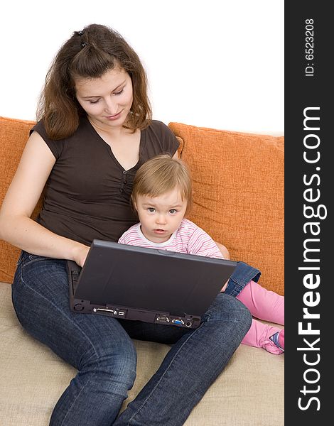 Happy family sitting on sofa with laptop. Happy family sitting on sofa with laptop