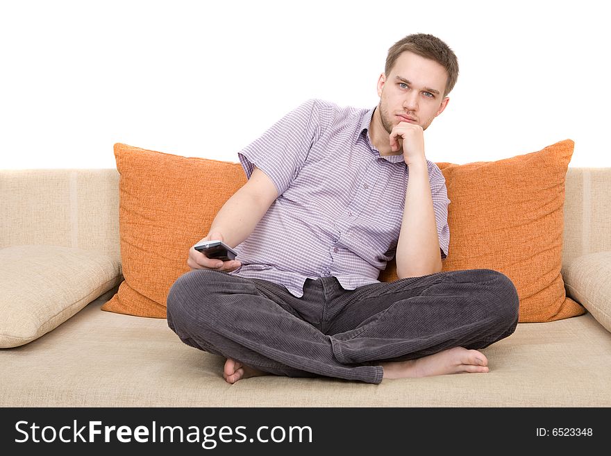 Casual man sitting on sofa. Casual man sitting on sofa