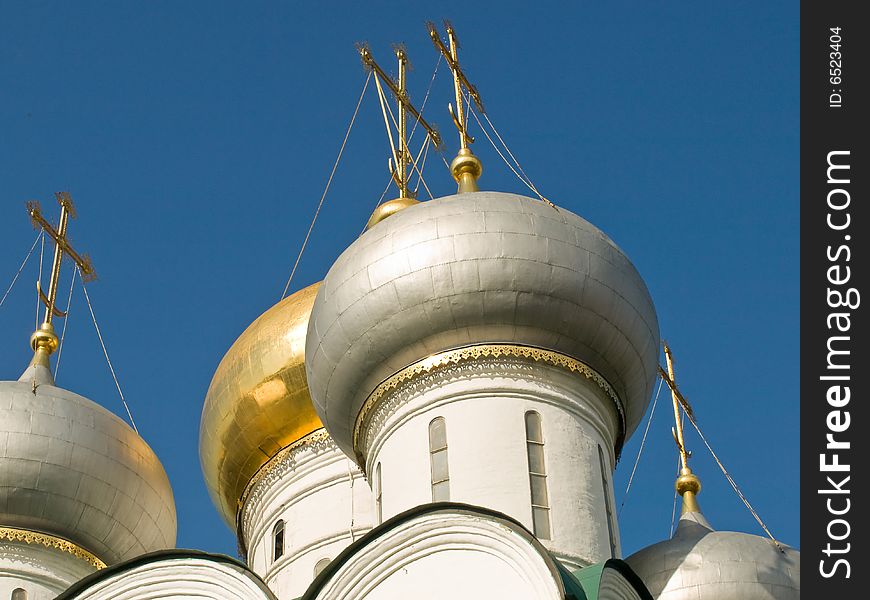 Domes of church against the blue sky in the autumn