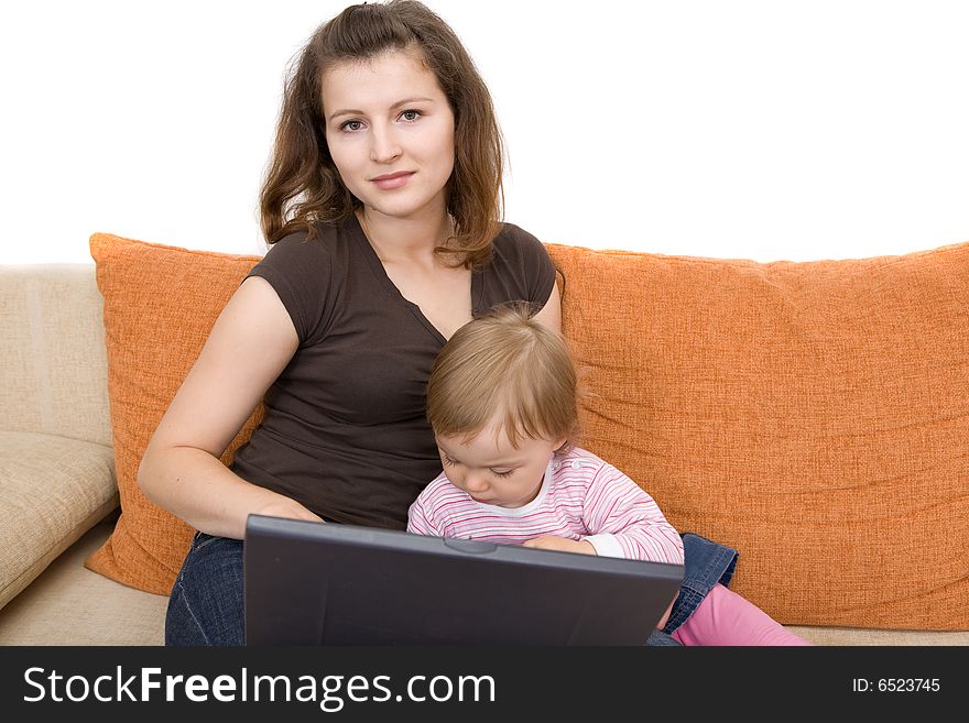 Happy family sitting on sofa with laptop. Happy family sitting on sofa with laptop