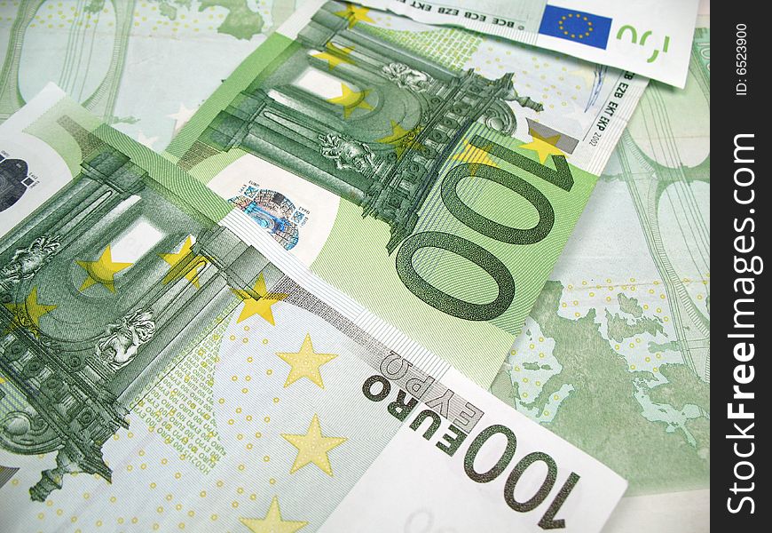A close-up picture of a couple of euro banknotes. A close-up picture of a couple of euro banknotes