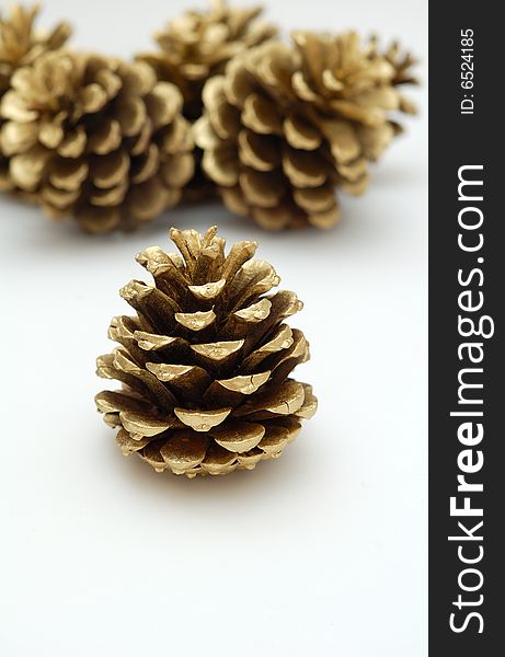 Golden cones on the white background