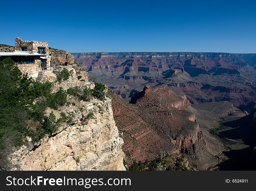 Hotel on the Grand Canyon over blue sky