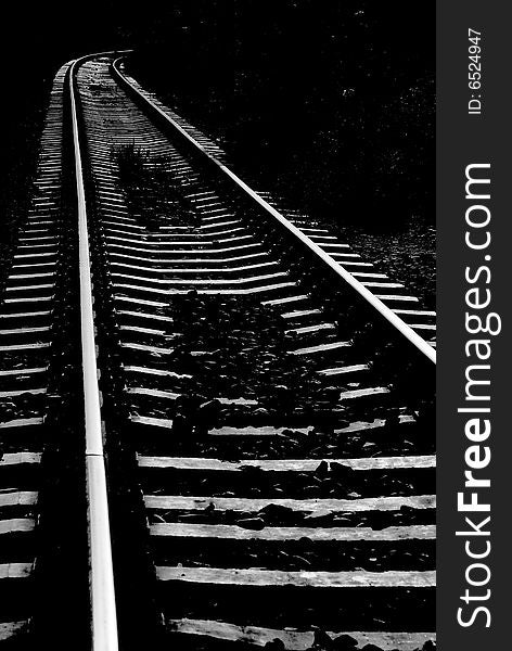 Looking down the train traks. shot in black and white. Looking down the train traks. shot in black and white