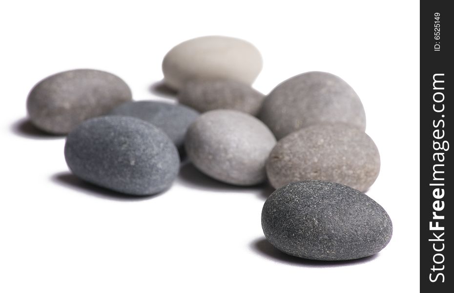 Group of smooth stones on white background. Group of smooth stones on white background