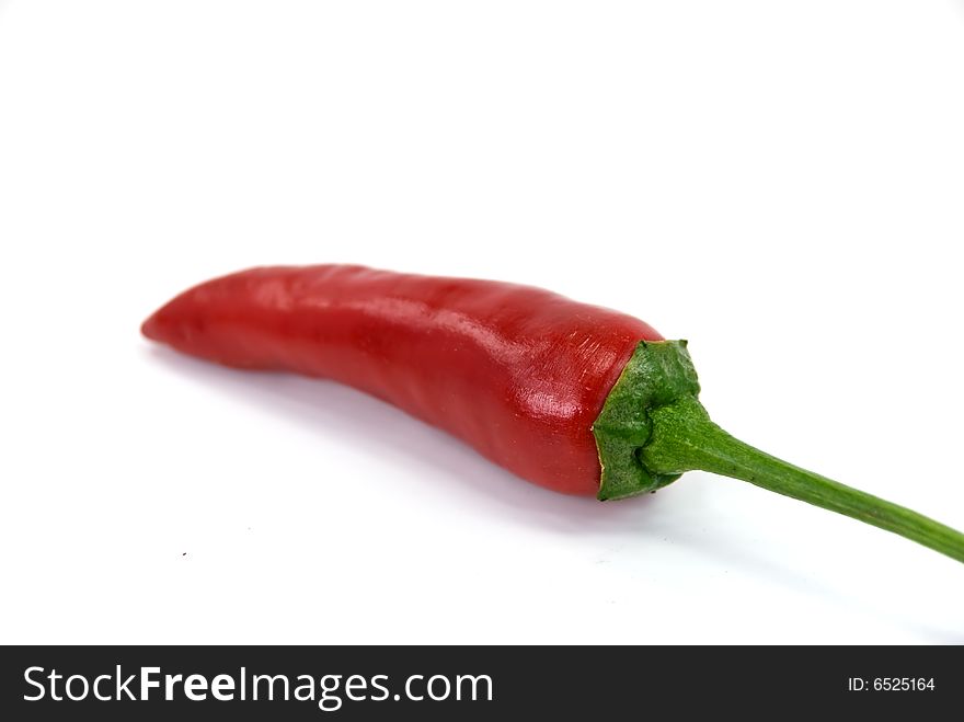 Red chili pepper - isolated on the white background.