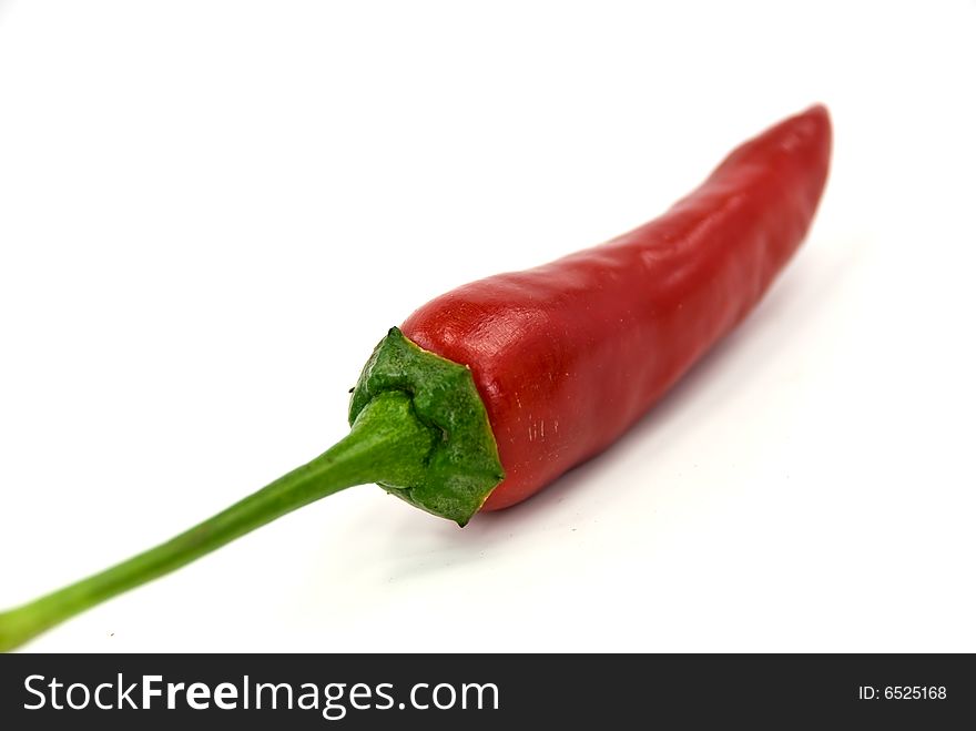 Red chili pepper - isolated on the white background.