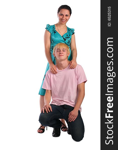 Young woamn stand behind young man siting on knee isolated