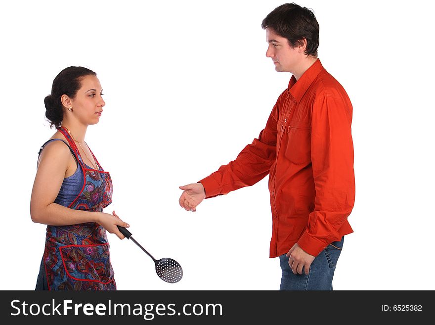 Young couple fight with ladle. Isolated.