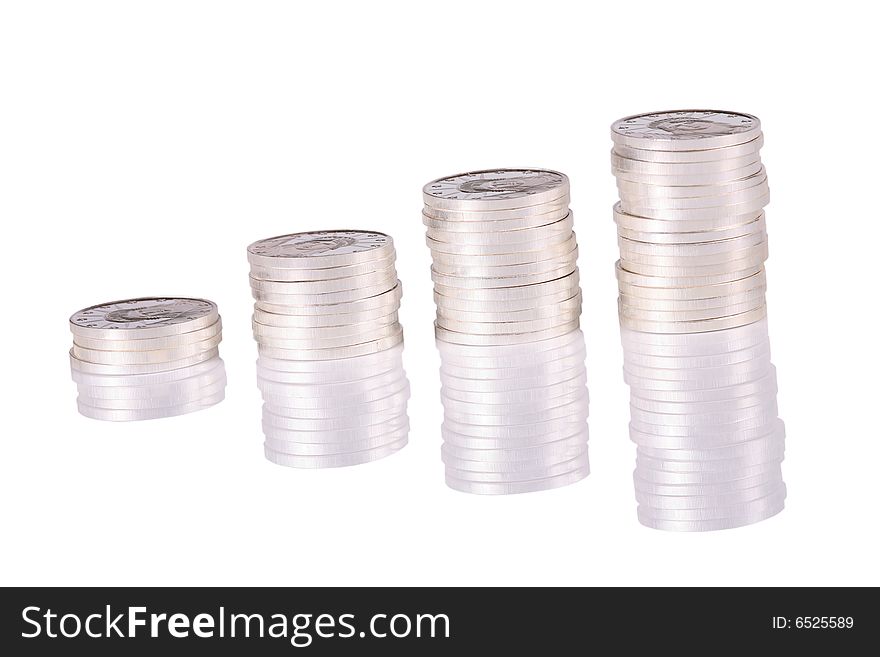 Stack of pure silver coins lineduponwhitewith reflections