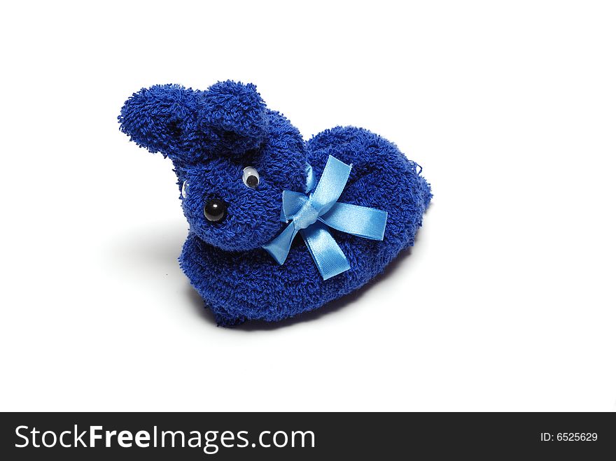 A picture of one blue stuffed rabbit. A picture of one blue stuffed rabbit