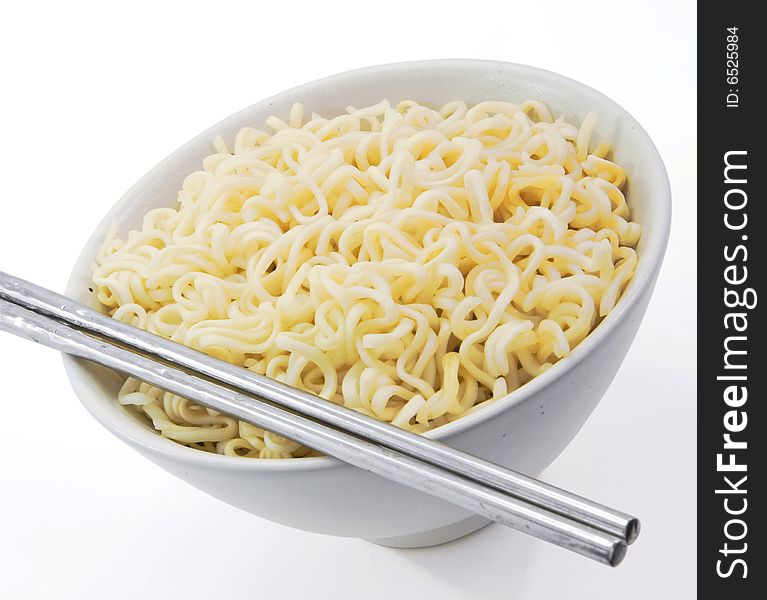 A bowl of noodles on white