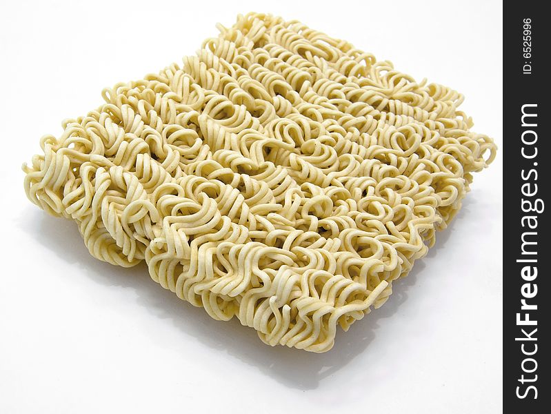 Un-cooked noodles on white. Un-cooked noodles on white