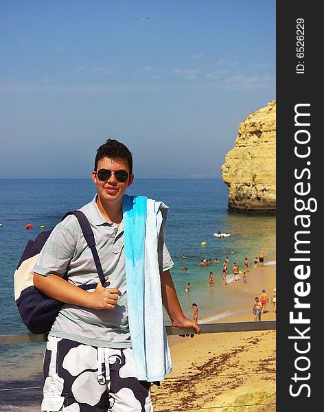 Young man next to sea.