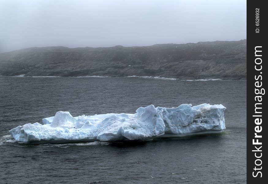 Large iceberg grounded on the ocean floor.