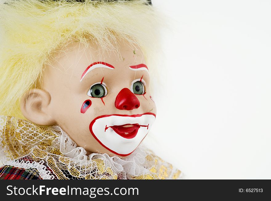 Vintage classic antique clown face  set against white background