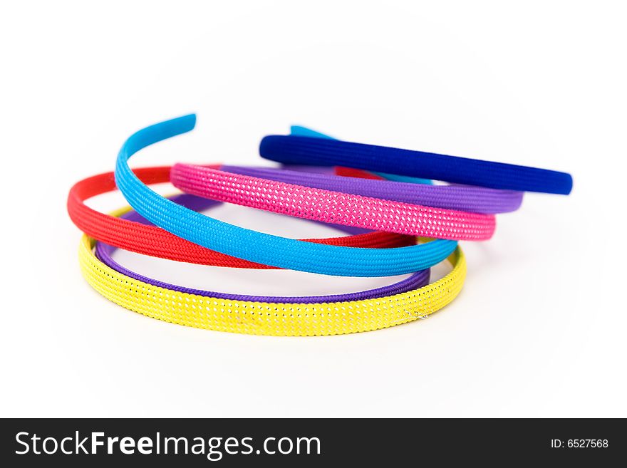 Colorful hair accessories on a white background. Colorful hair accessories on a white background