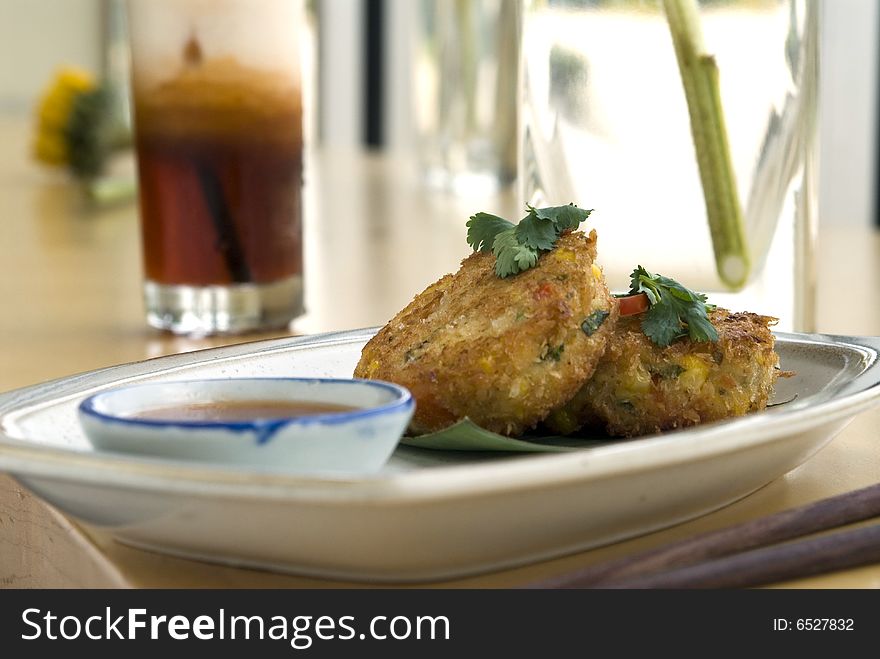 Asian fried vegetable cakes with sweet and sour sauce. Asian fried vegetable cakes with sweet and sour sauce