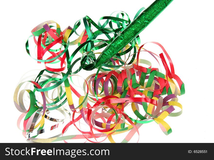 Curly ribbons and party blower isolated on white background