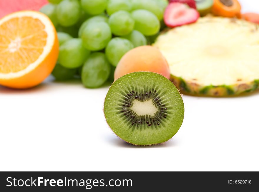 Slice kiwi on fruits background