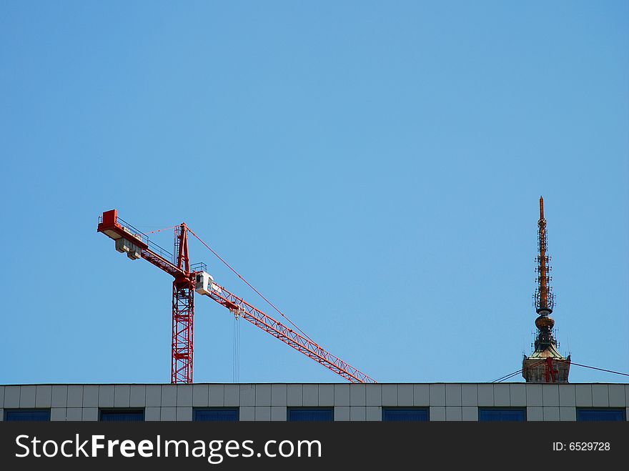Steel crane at a high rise building site. Steel crane at a high rise building site