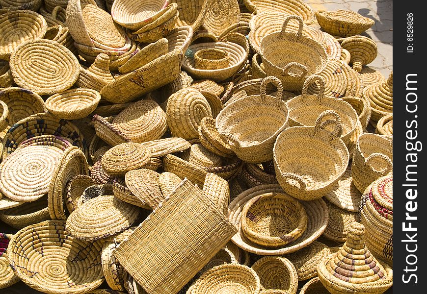 A lot of wicker baskets in market place. Marocco, Marrakesh. A lot of wicker baskets in market place. Marocco, Marrakesh