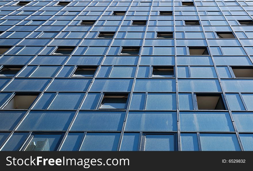 Wall of modern office building and sky reflection. Wall of modern office building and sky reflection