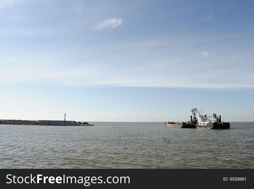 Dredger works in gulf of Finland of Baltic sea. Dredger works in gulf of Finland of Baltic sea.