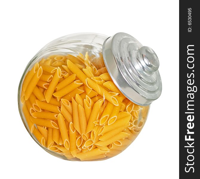 Transparent jar with yellow Italian pasta isolated