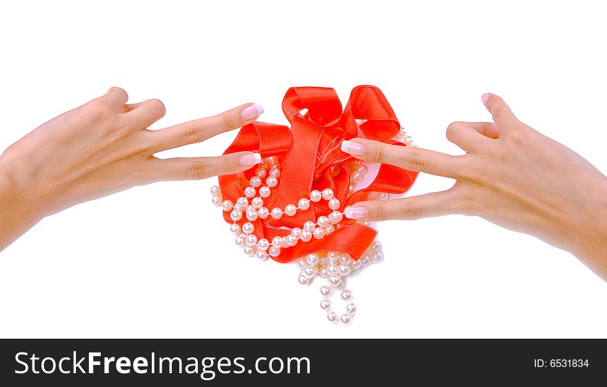 Beautiful woman`s hands with pearls