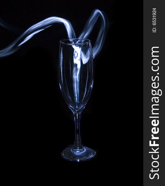 Smoke in the glass on black ground