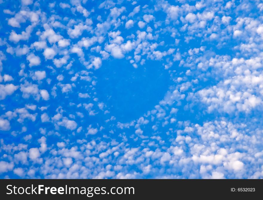 On blue sky beautiful white clouds made a hart. On blue sky beautiful white clouds made a hart