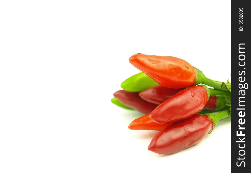 Chili pepper and hot red pepper very close