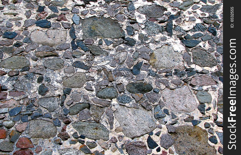 Old grey wall mede of stones. Old grey wall mede of stones