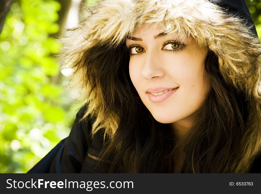 Woman portrait wearing a fur cap.