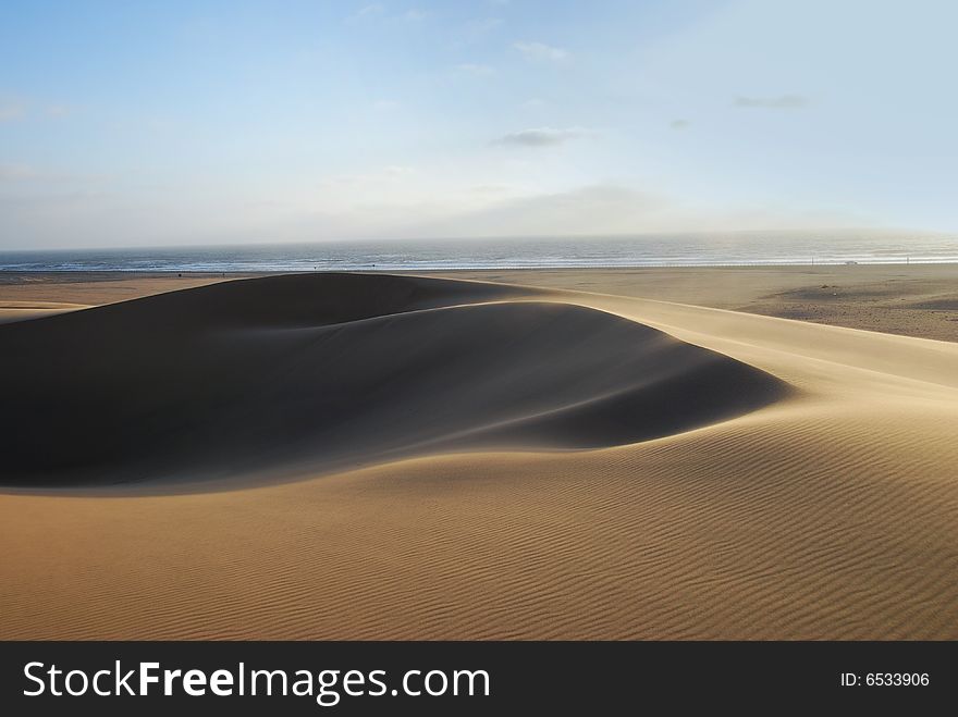 Sands of Namib desert and the Atlantic Ocean. Sands of Namib desert and the Atlantic Ocean