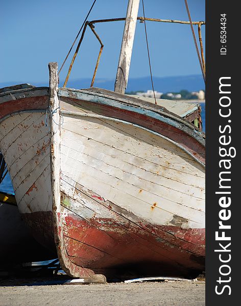 Old boat on the shore of the Black Sea. Nessebar, Bulgaria.