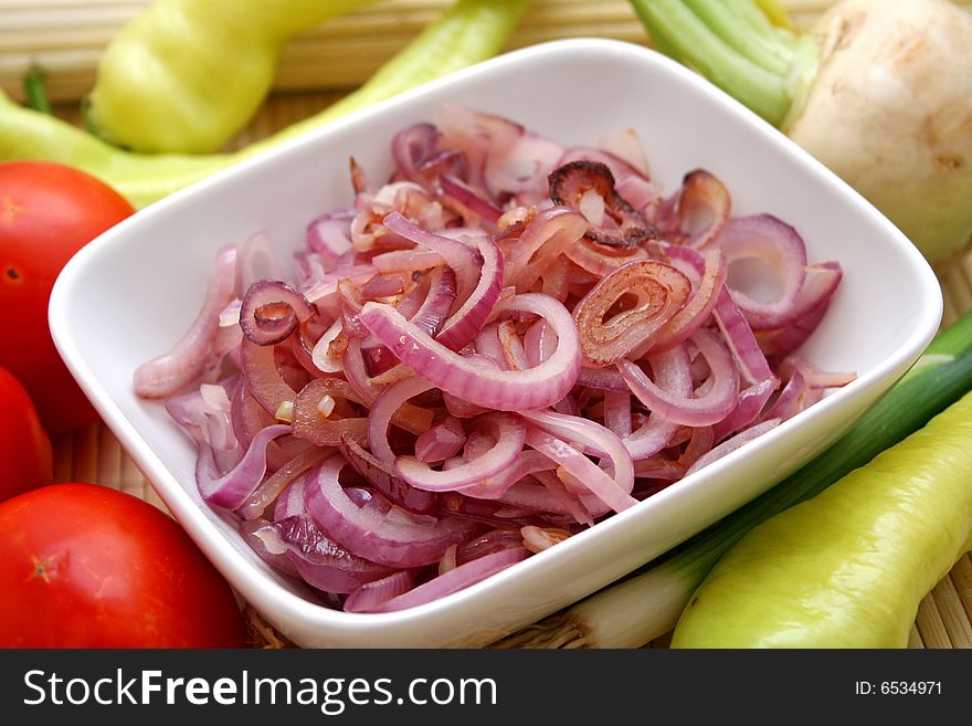 Some cooked red onions in a bowl