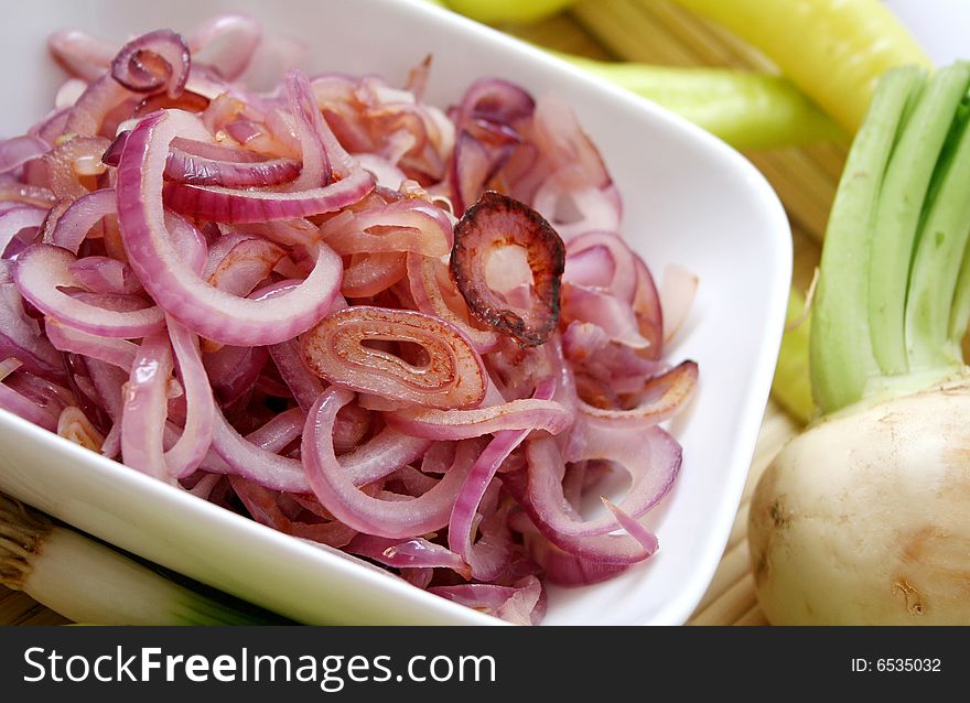 Some cooked red onions in a bowl