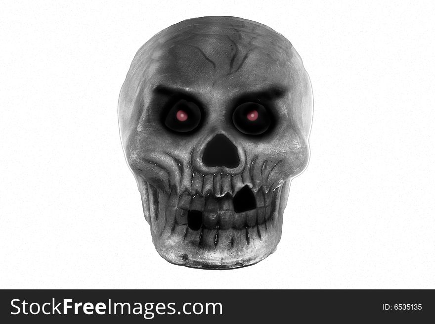 A dark, red eyed skull glares menacingly