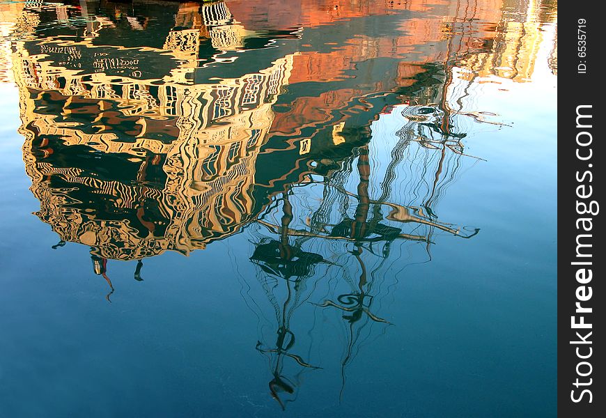 Water reflection of a 17th century clipper ship - Malaga, Spain.