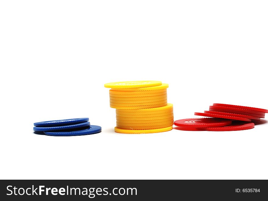 Stack of multi colored pocker chips isolated over white. Stack of multi colored pocker chips isolated over white