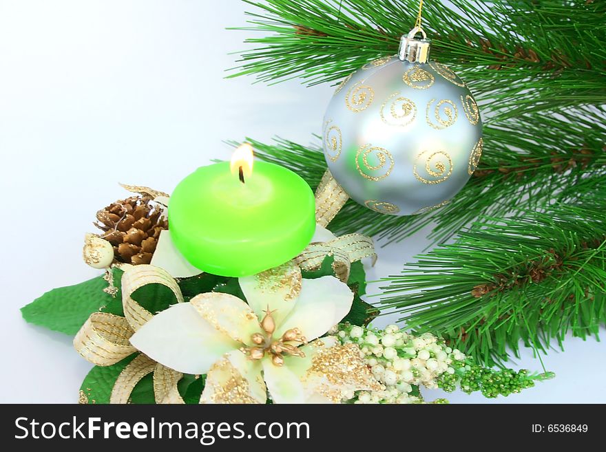 Christmas ornaments.Gray ball,fir-tree,candle,flowers.