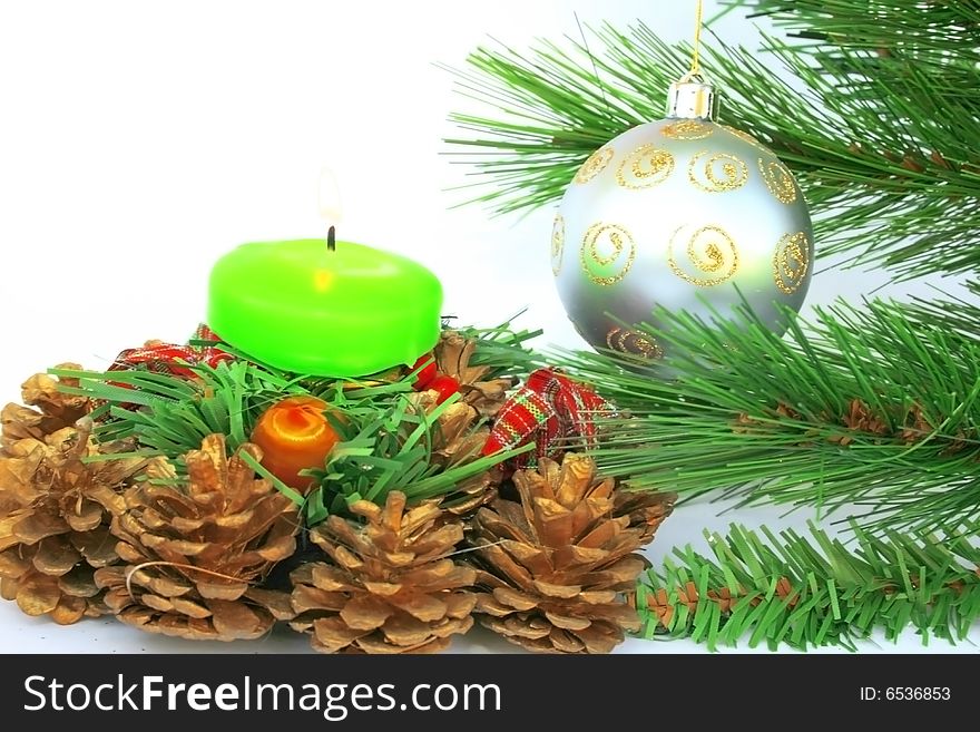 Christmas ornaments.Gray ball,fir-tree,candle,cones.
