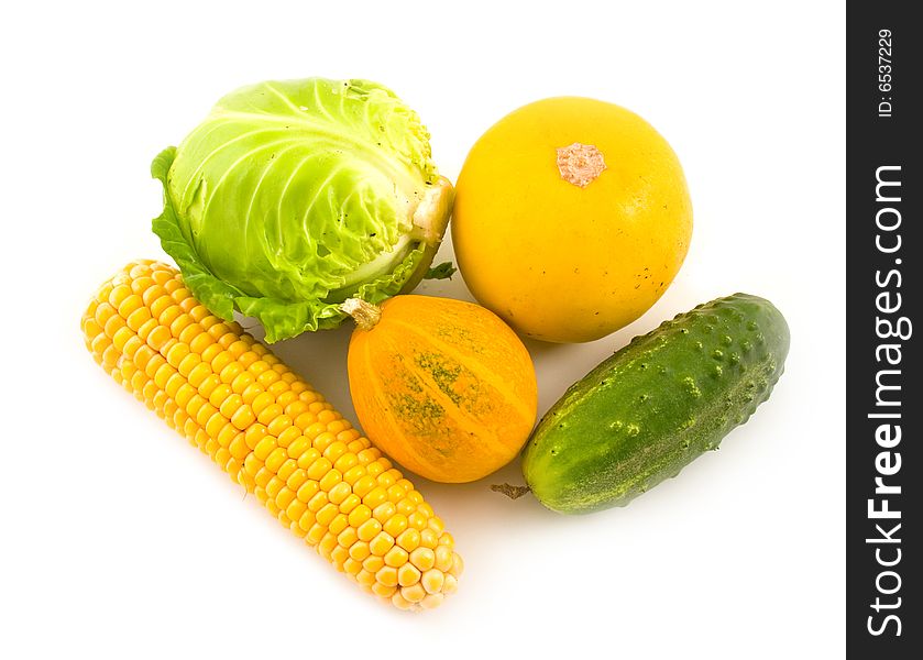 Ripe tasty and useful vegetables white background ears corn green cucumbers pumpkin