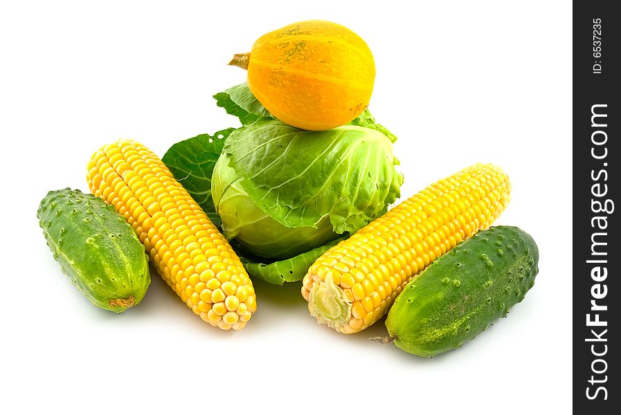 Green ripe and tasty useful yellow vegetables on white background