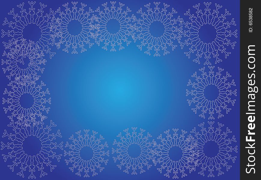Snowflakes on blue background. Copy space included.