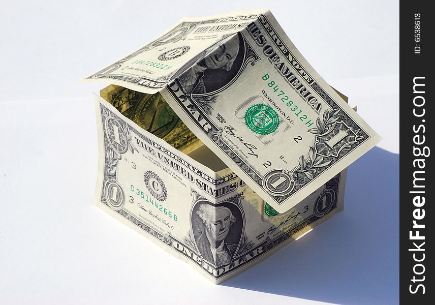 Conceptual image of house made from US dollars. Conceptual image of house made from US dollars