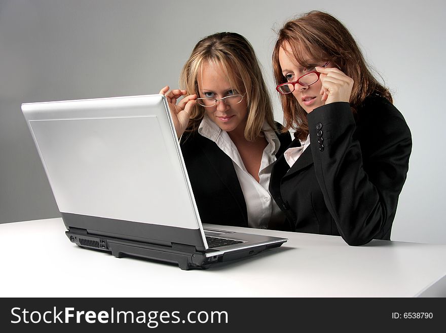 Two woman with a laptop. Two woman with a laptop